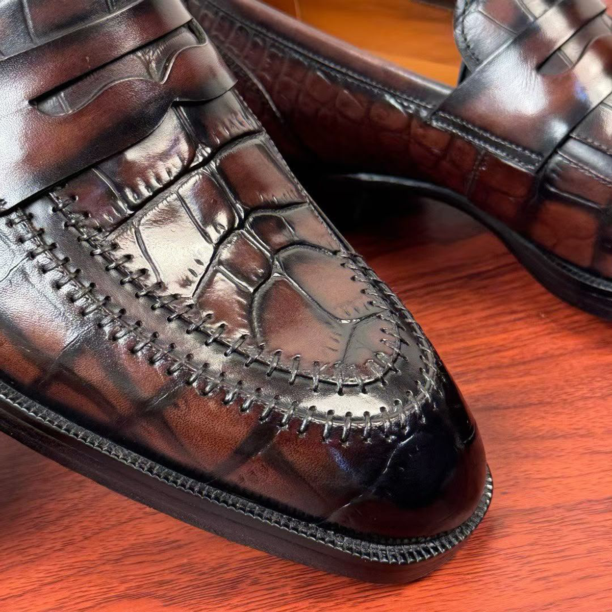 Berluti Paris croc embossed loafers feature a brown leather