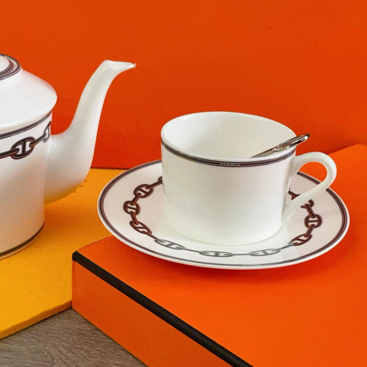 luxurious Herms Chaine dAncre porcelain tea set in platinum silver featuring iconic anchor chain motifs