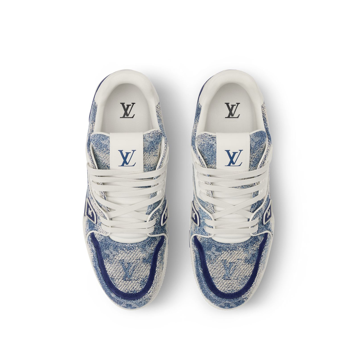 Louis Vuitton LV Trainer Sneakers crafted from blue Monogram denim with a cloud like effect