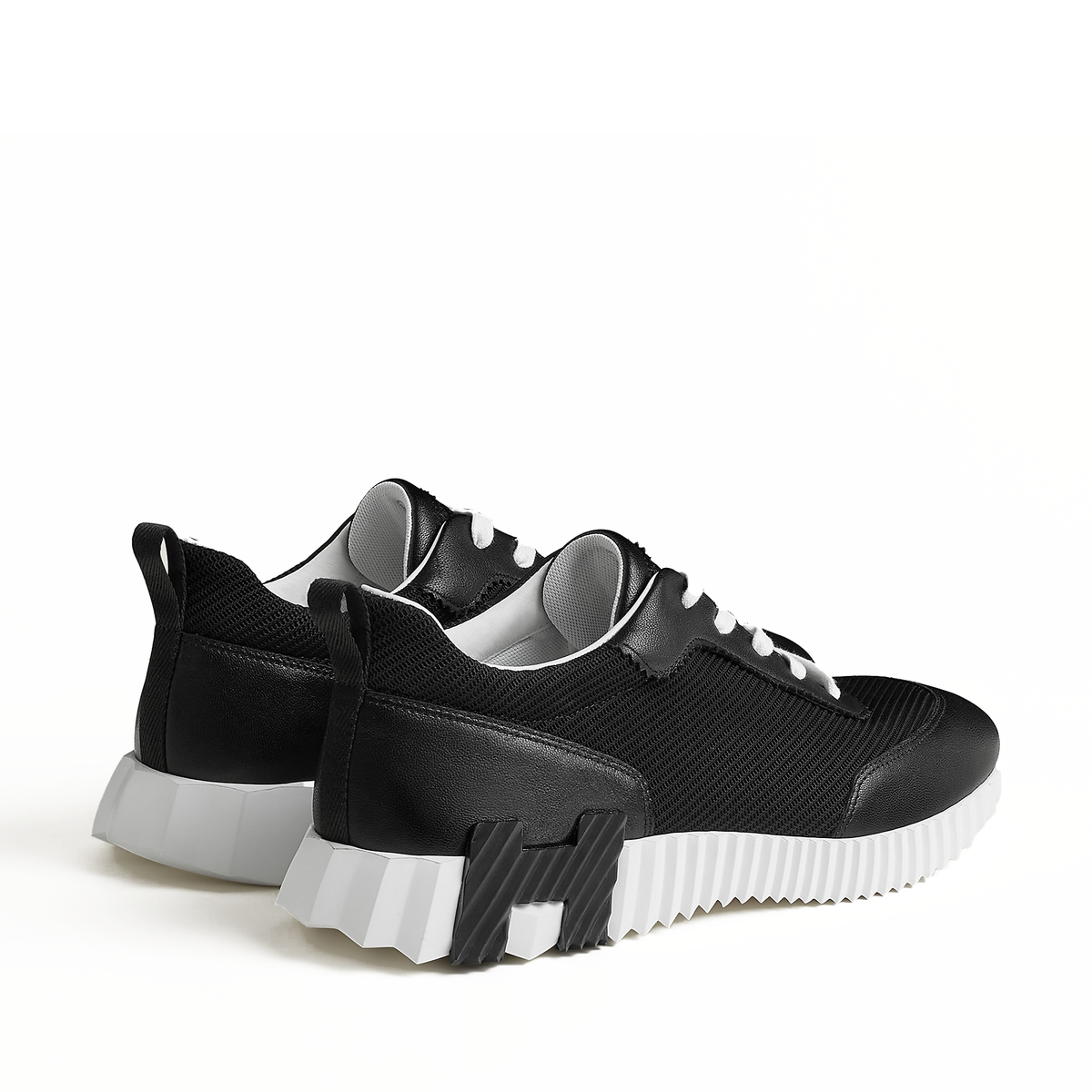 Hermes Bouncing Sneakers in black technical mesh and goatskin