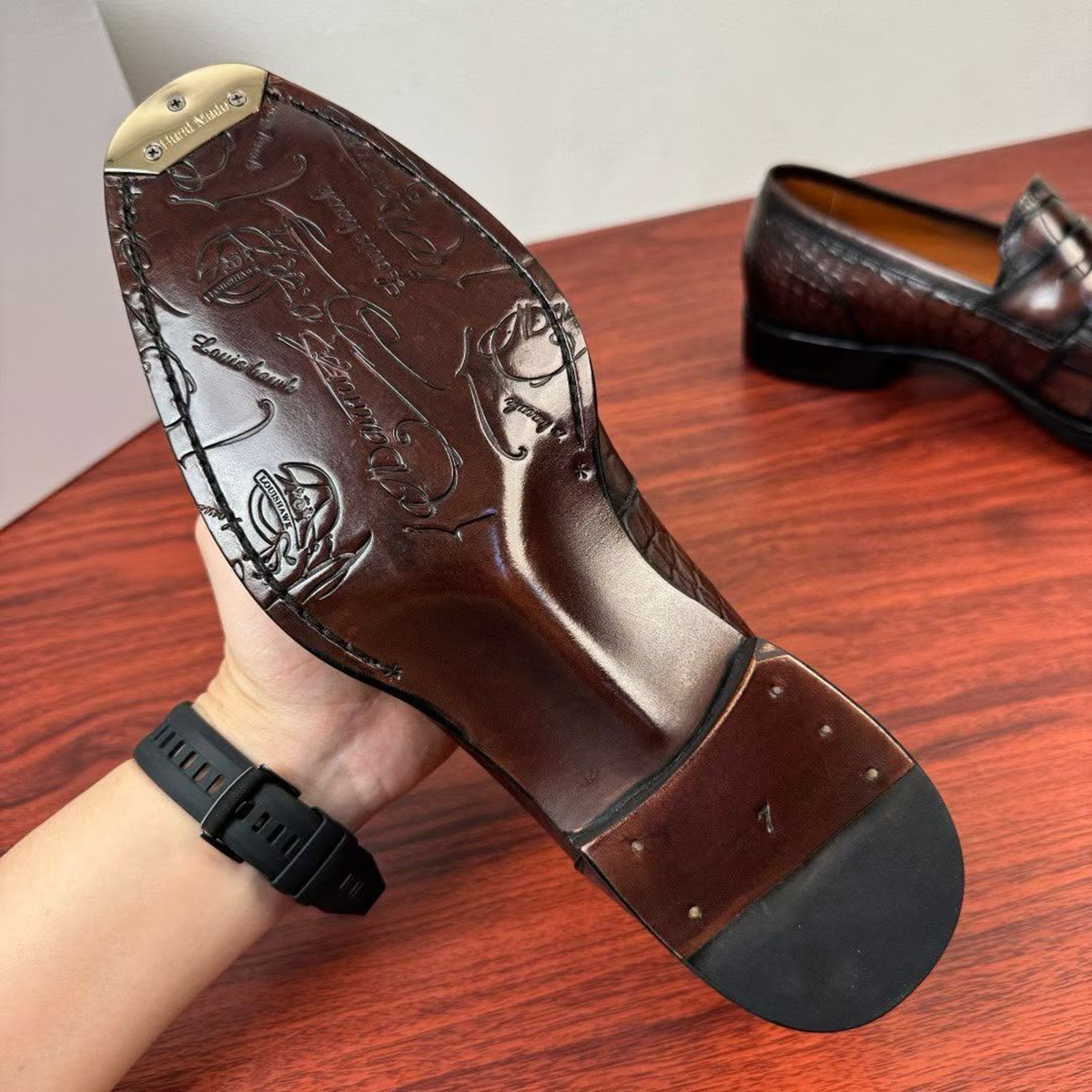 Berluti Paris croc embossed loafers feature a brown leather