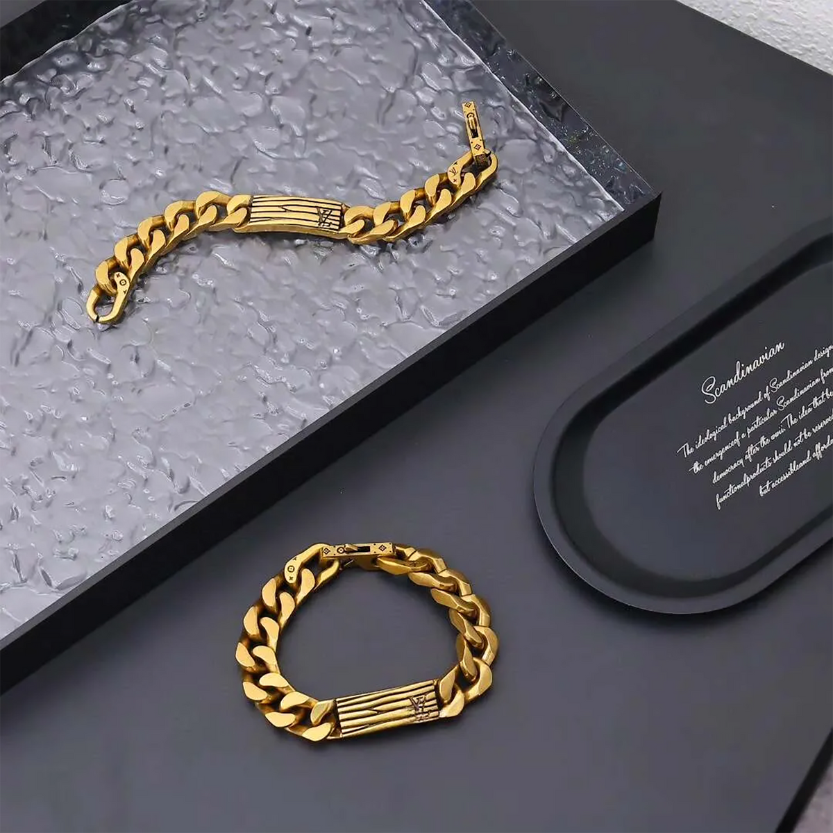 Louis Vuitton Gold color metal chain bracelet with an engraved Monogram pattern