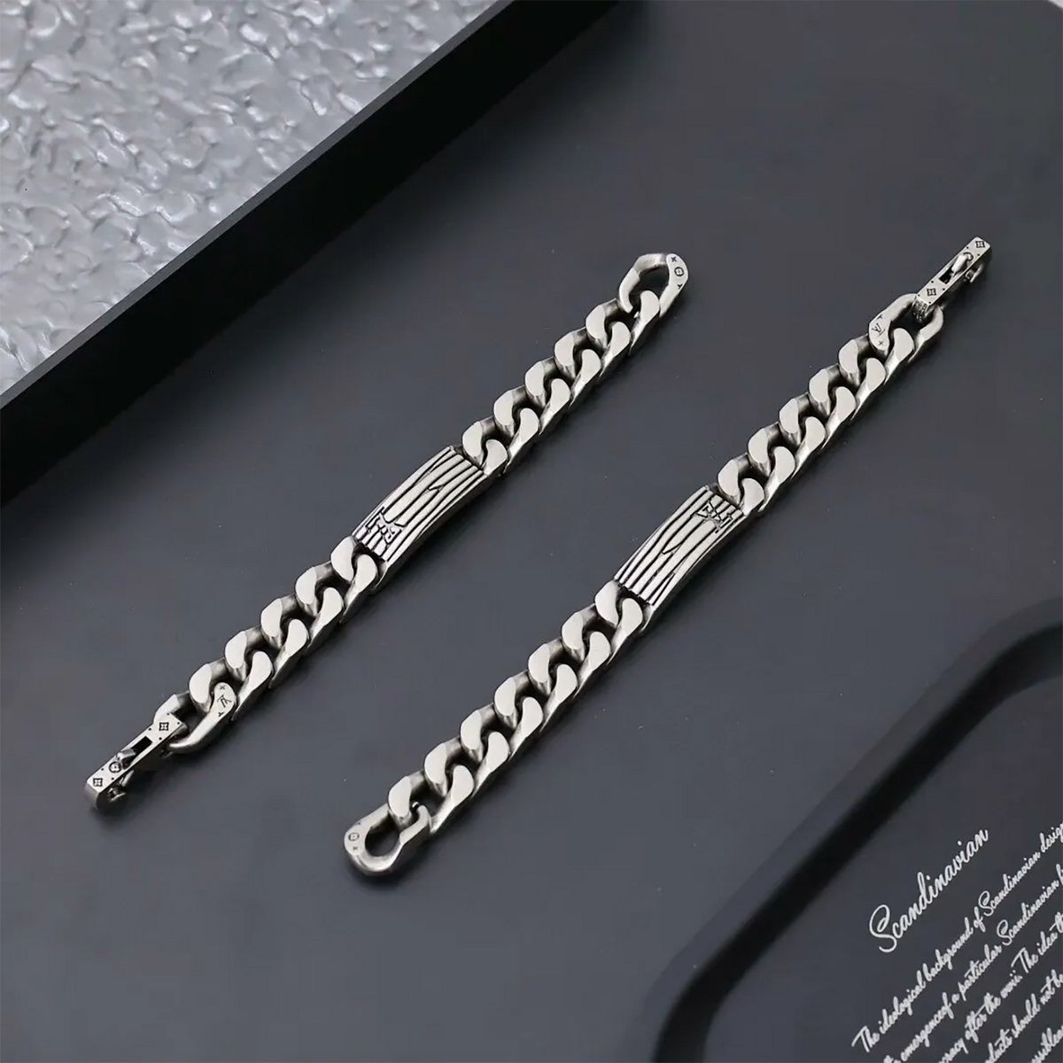 Louis Vuitton silver color metal chain bracelet with an engraved Monogram pattern