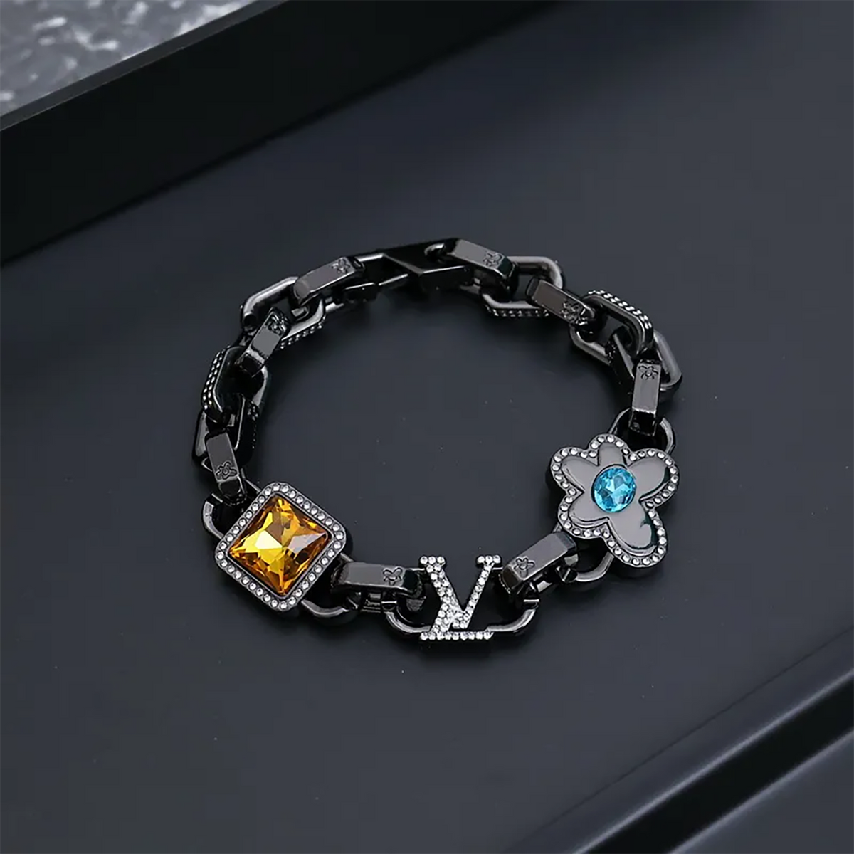Louis Vuitton Monogram Black bracelet featuring black silver