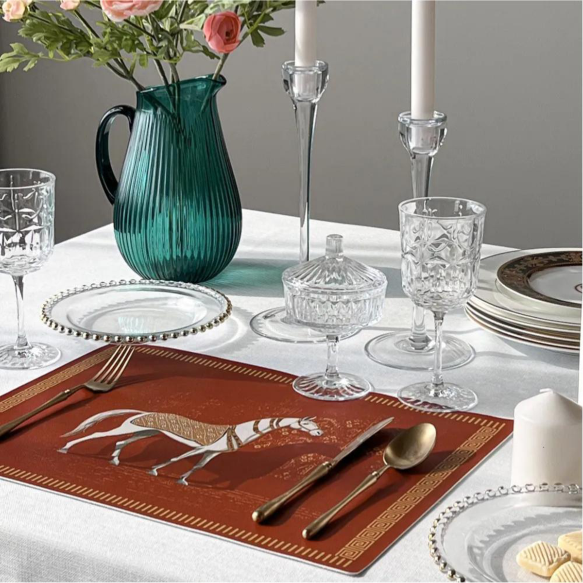 Hermès table placemat featuring a teal red background — view 2