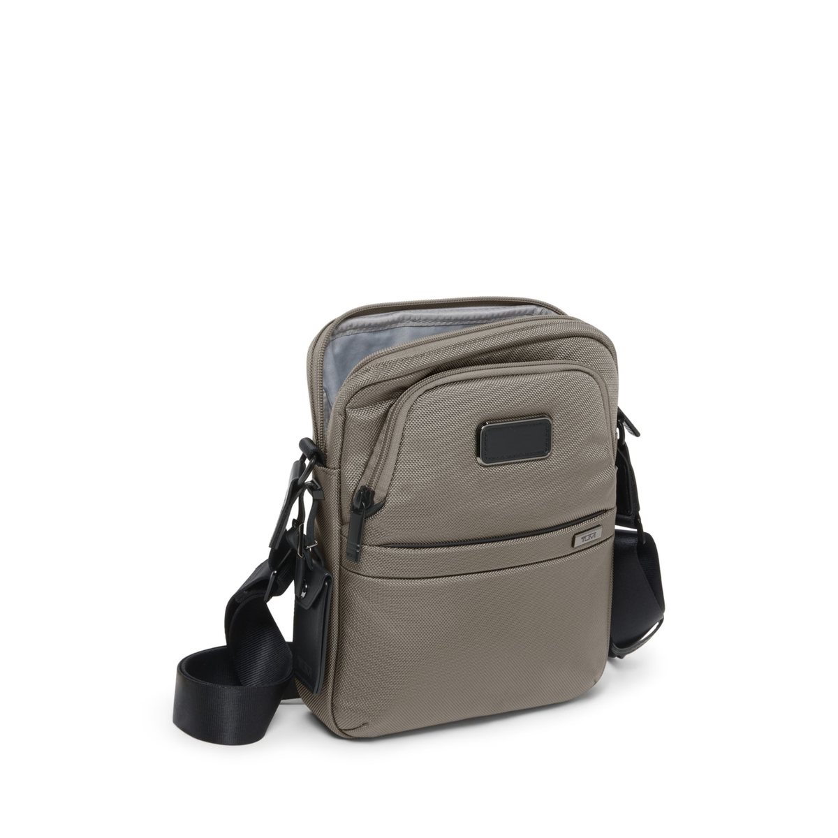 Tumi Alpha Medium Crossbody bag featuring a durable Beige