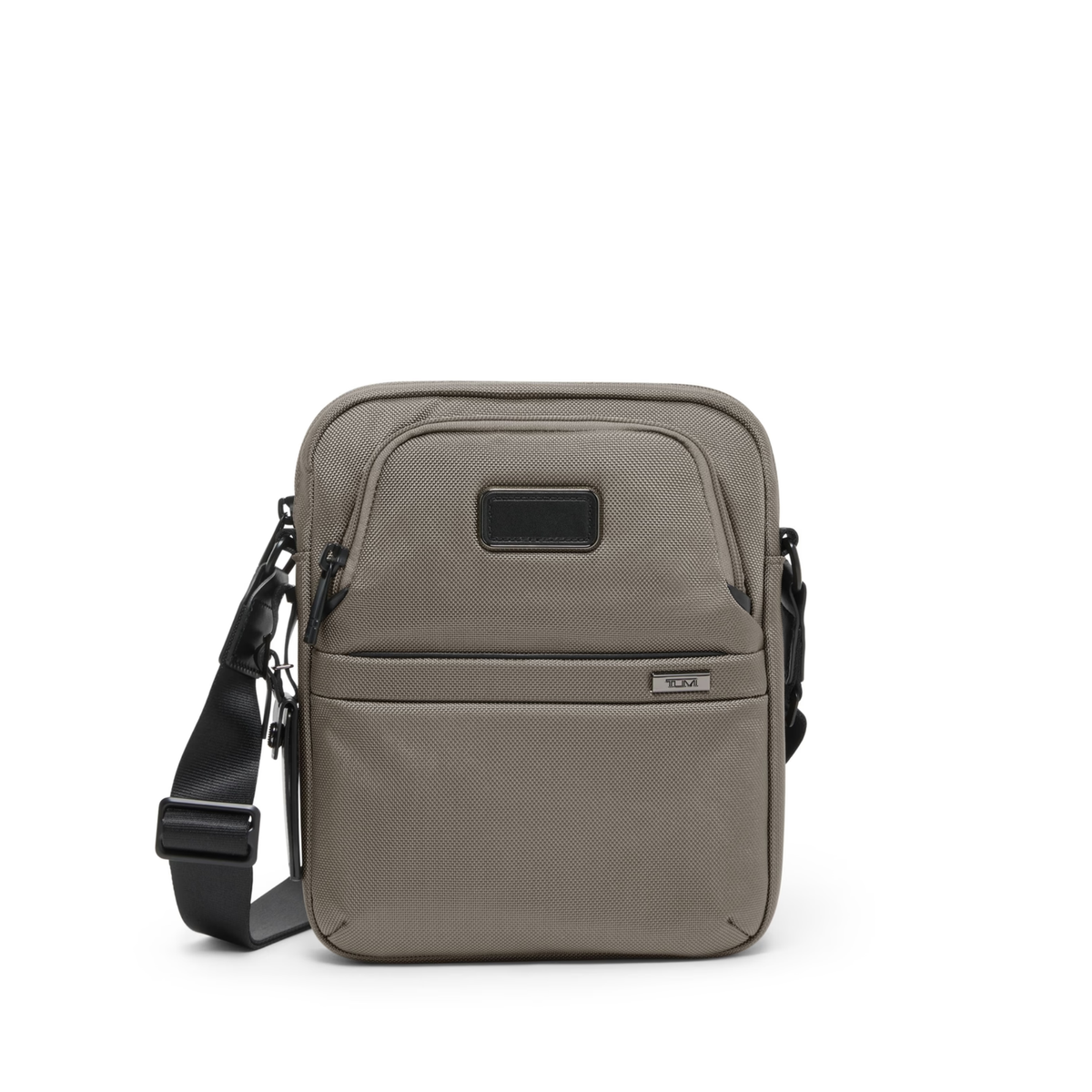 Tumi Alpha Medium Crossbody bag featuring a durable Beige