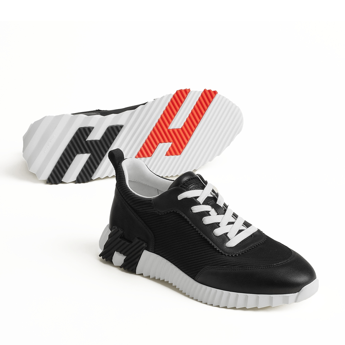 Hermes Bouncing Sneakers in black technical mesh and goatskin
